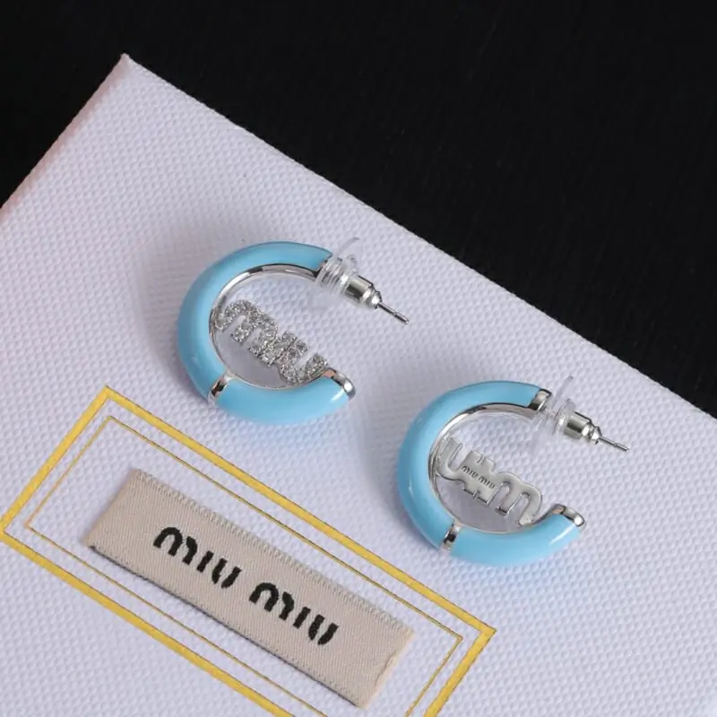 miu miu boucles doreilles pour femme s_12341103